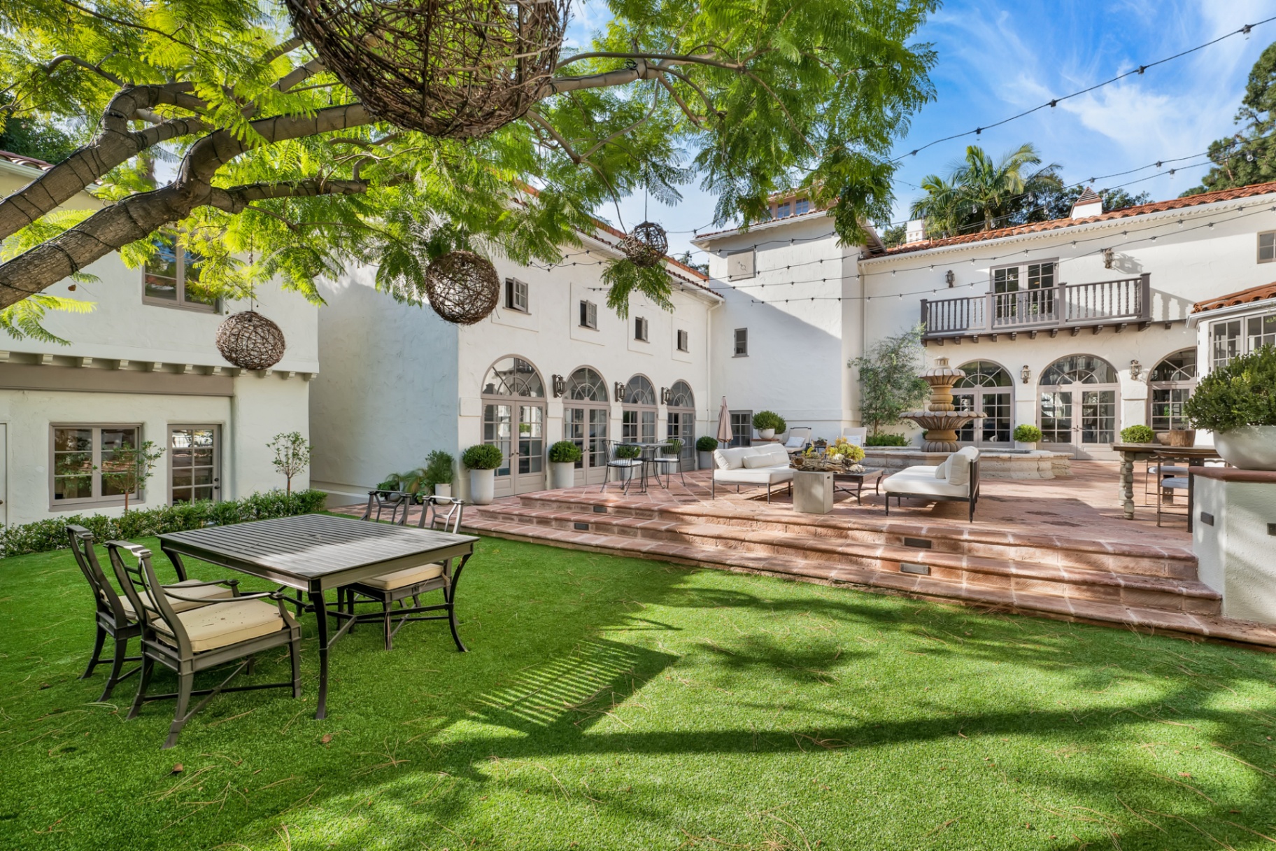 Arched loggia and rear courtyard at Villa Del Sol