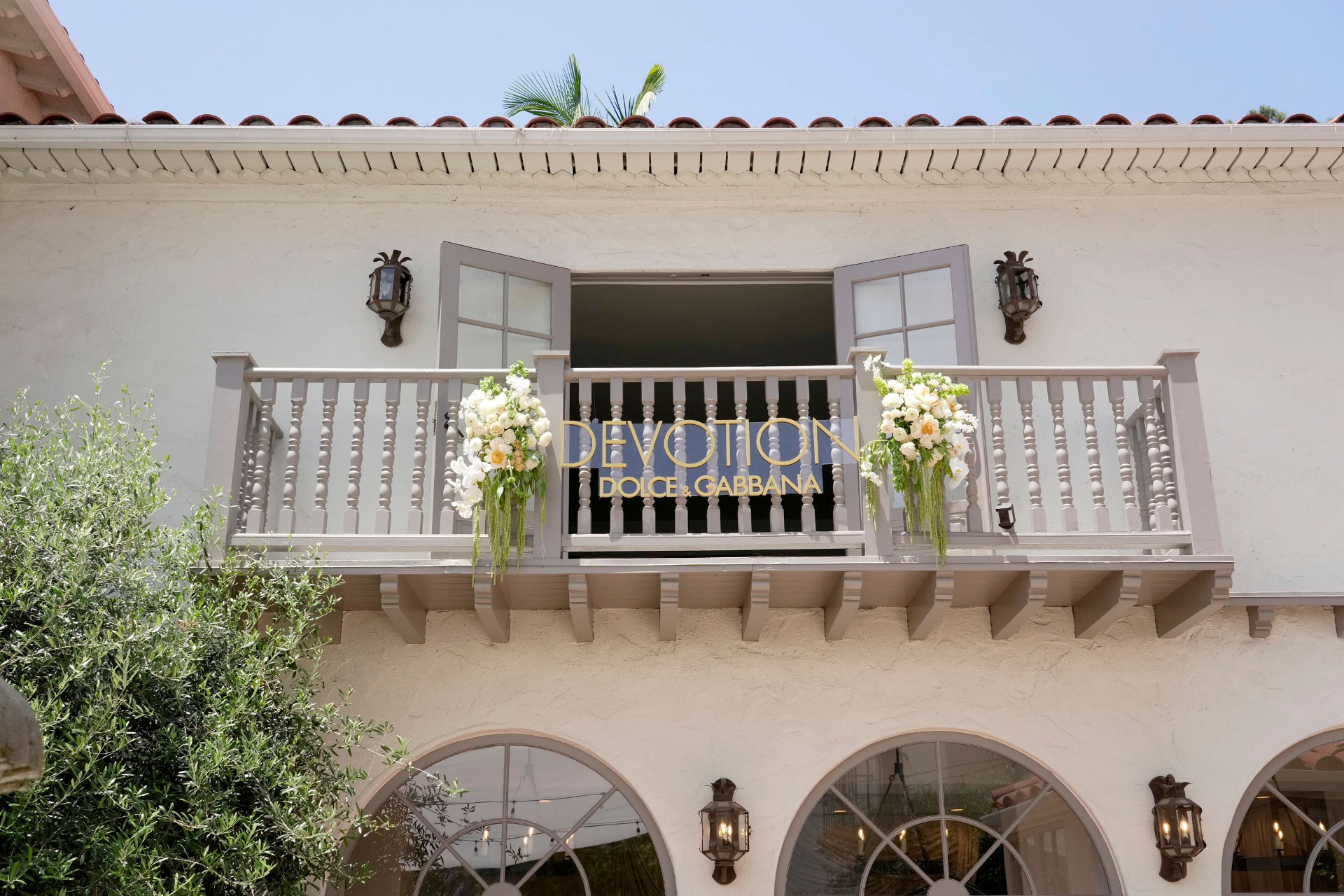 Dolce & Gabbana Devotion signage on the villa balcony